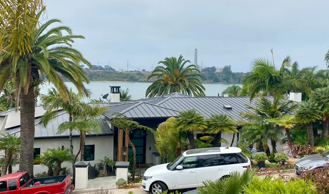 Standing seam metal roof on a waterfront San Diego estate home